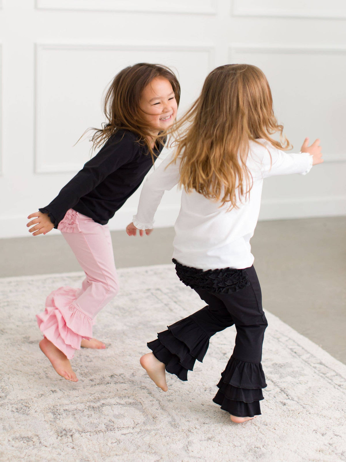 Toddler Girls Black Ruffle Flare Pants with Signature Rear Ruffles
